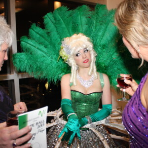 Arkansas Democrat-Gazette/BOBBY AMPEZZAN - 3/9/13 - "Champagne Girl" Madeline Kiley of J&D Entertainment shows off the Alwand Vahan bracelet from Jones & Son Diamond and Bridal Fine Jewelry, a raffle item at the 20th Century Club's Hope Ball at the Statehouse Convention Center.