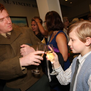 Arkansas Democrat-Gazette/BOBBY AMPEZZAN / 7/22/15 / Matthew Maguire ("Horace") toasts Corbin Pitts (Toby Miniver) at the world premiere of Mrs. Miniver at the Argenta Community Theater.