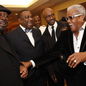 Arkansas Democrat-Gazette/BOBBY AMPEZZAN - 12/22/13 - A.D. Washington, Greg Summers, Joe Gray and George Daniels of Chicago at the 11th annual fundraiser for the Tidwell Project, Inc., titled "Celebrate the Moments of the Season" at the Marriot Hotel ballroom.