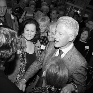 Arkansas Democrat-Gazette/BOBBY AMPEZZAN - 1-25-13 - President Bill Clinton greets Minnesotan Brian Levenson at the Arkansas Travelers reunion Friday night at the Arkansas Studies Institute.